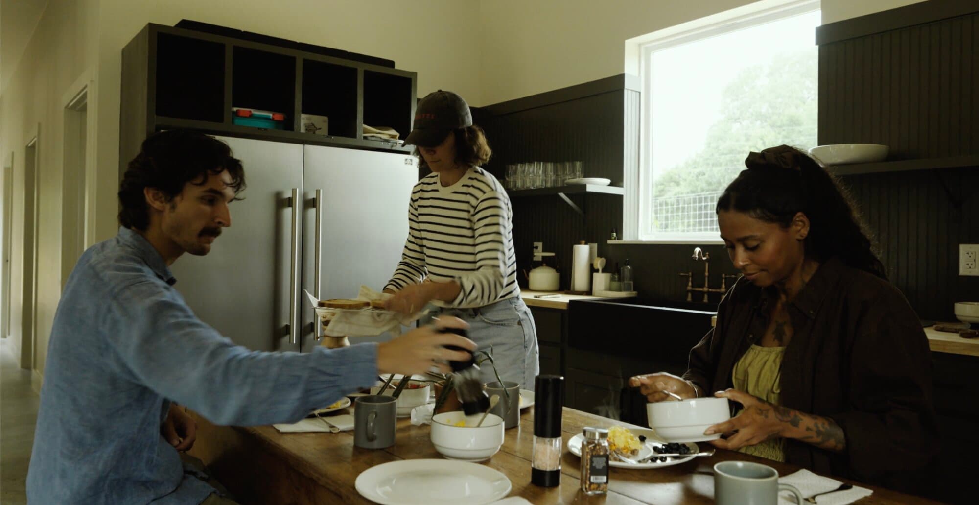 Friends making breakfast together in the Commons kitchen